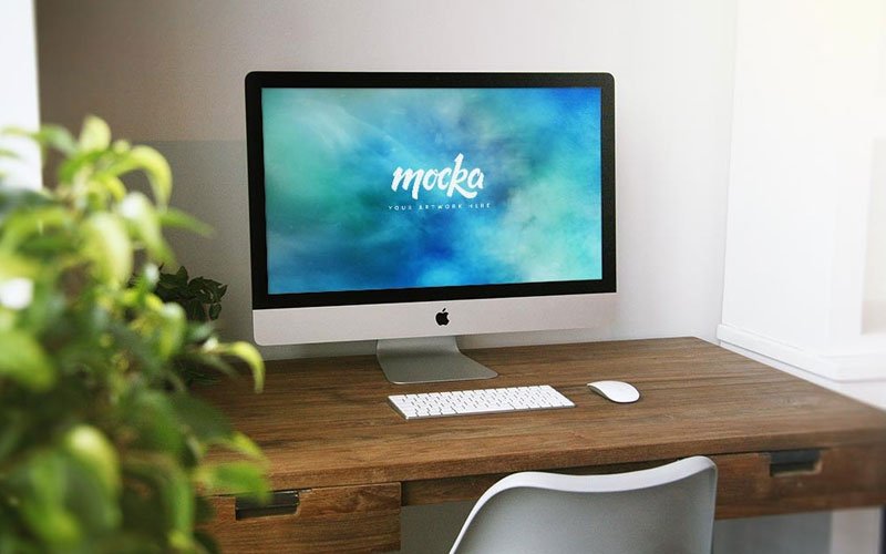 Free-iMac-on-Home-Desk-Mockup