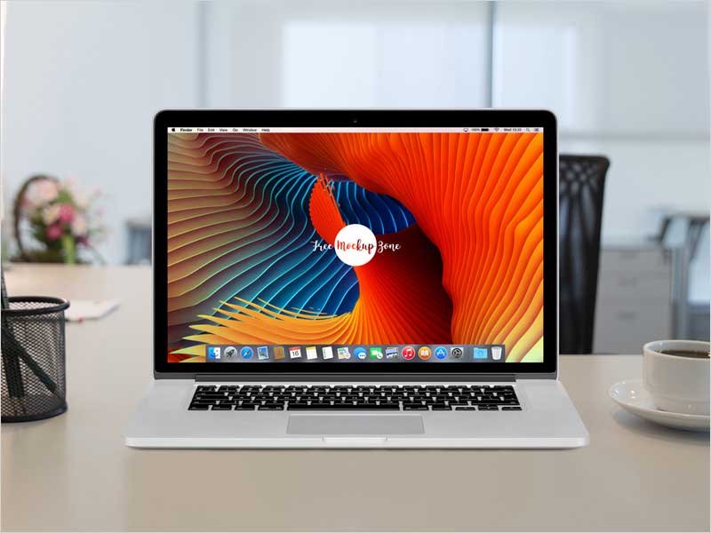 Free-Apple-Macbook-Pro-Retina-On-Workstation-Mockup