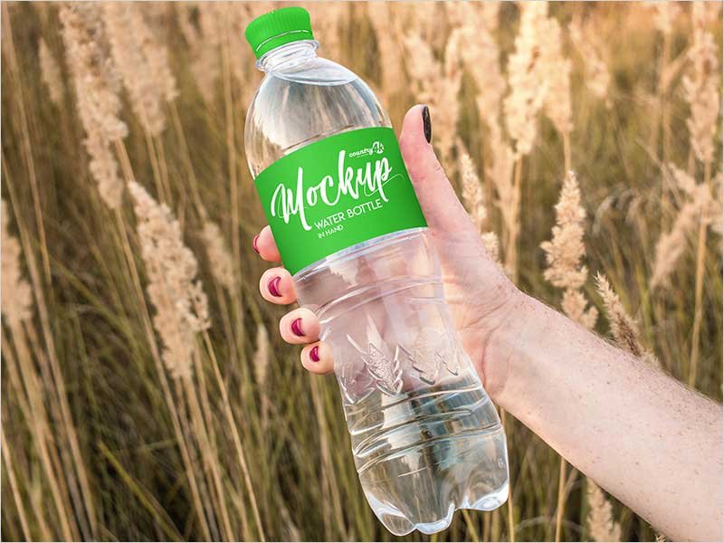 Free-Water-Bottle-in-Hand-PSD-MockUp-in-4k