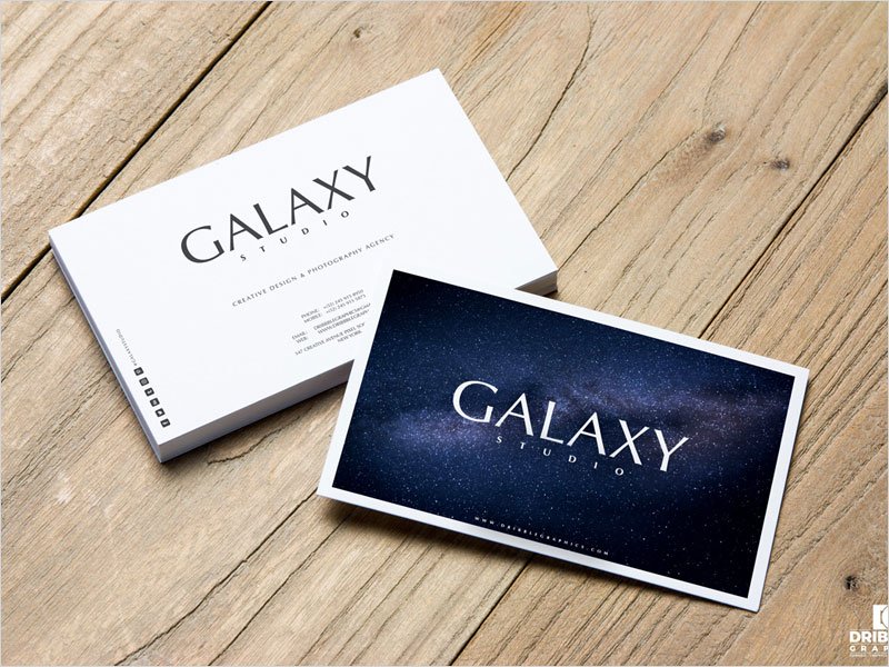 Free-Business-Cards-On-Wooden-Background-Mockup
