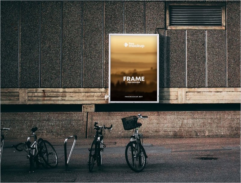 Poster-Frame-in-Street-with-Bikes-Free-Mockup