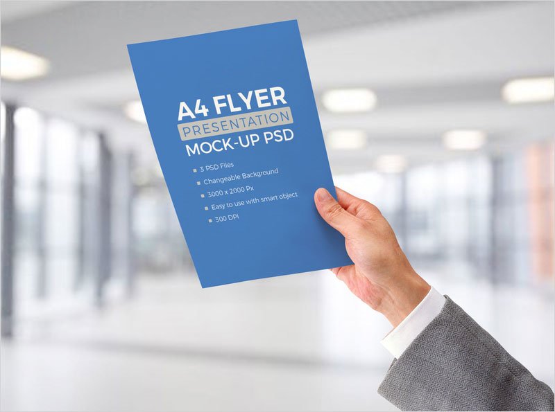 Free-A4-Paper-In-Male-Hand-Mockup-Psd